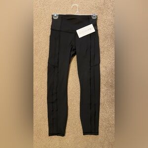 Athleta Ultimate Stash High Rise 7/8 Tight